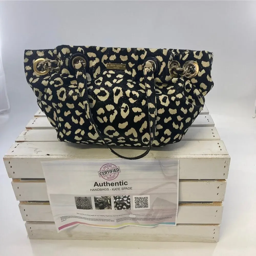 KATE SPADE BLACK AND CREAM ANIMAL PRINT SHOULDER BAG